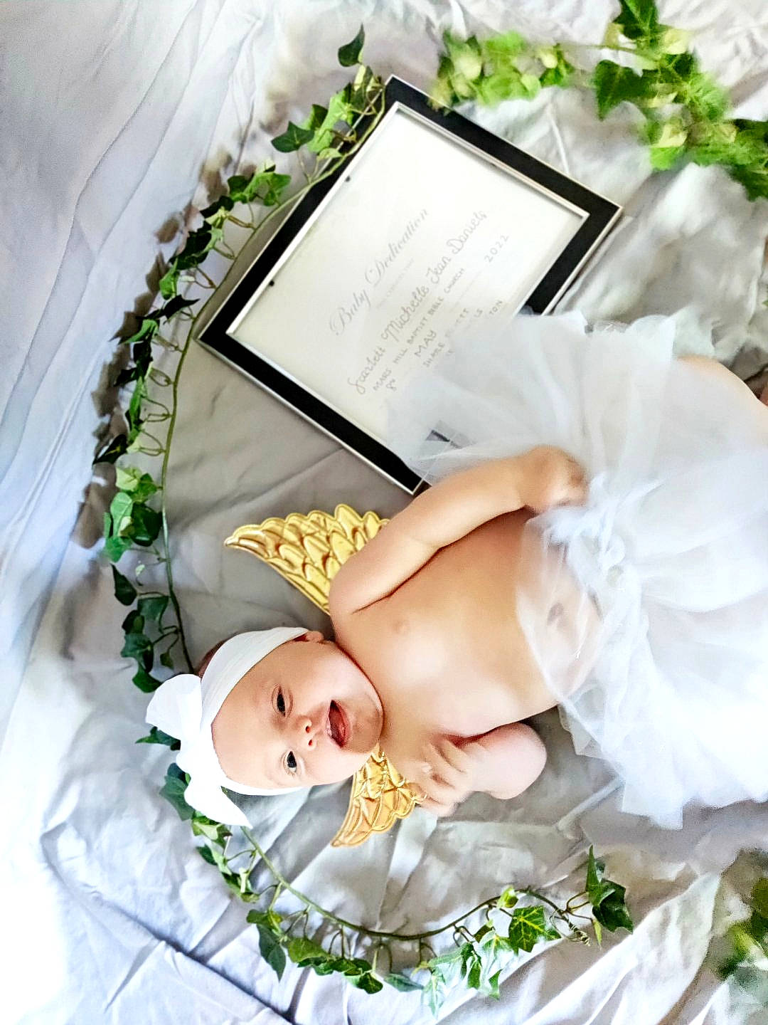 Scarlett joined the competition — help win amazing prizes! baby, baby_toddler_clothing, beauty, bouquet, child, cut_flowers, dress, event, fashion_accessory, floral_design, flower_arranging, hand, happy, headpiece, headwear, person, petal, picture_frame, plant, rose