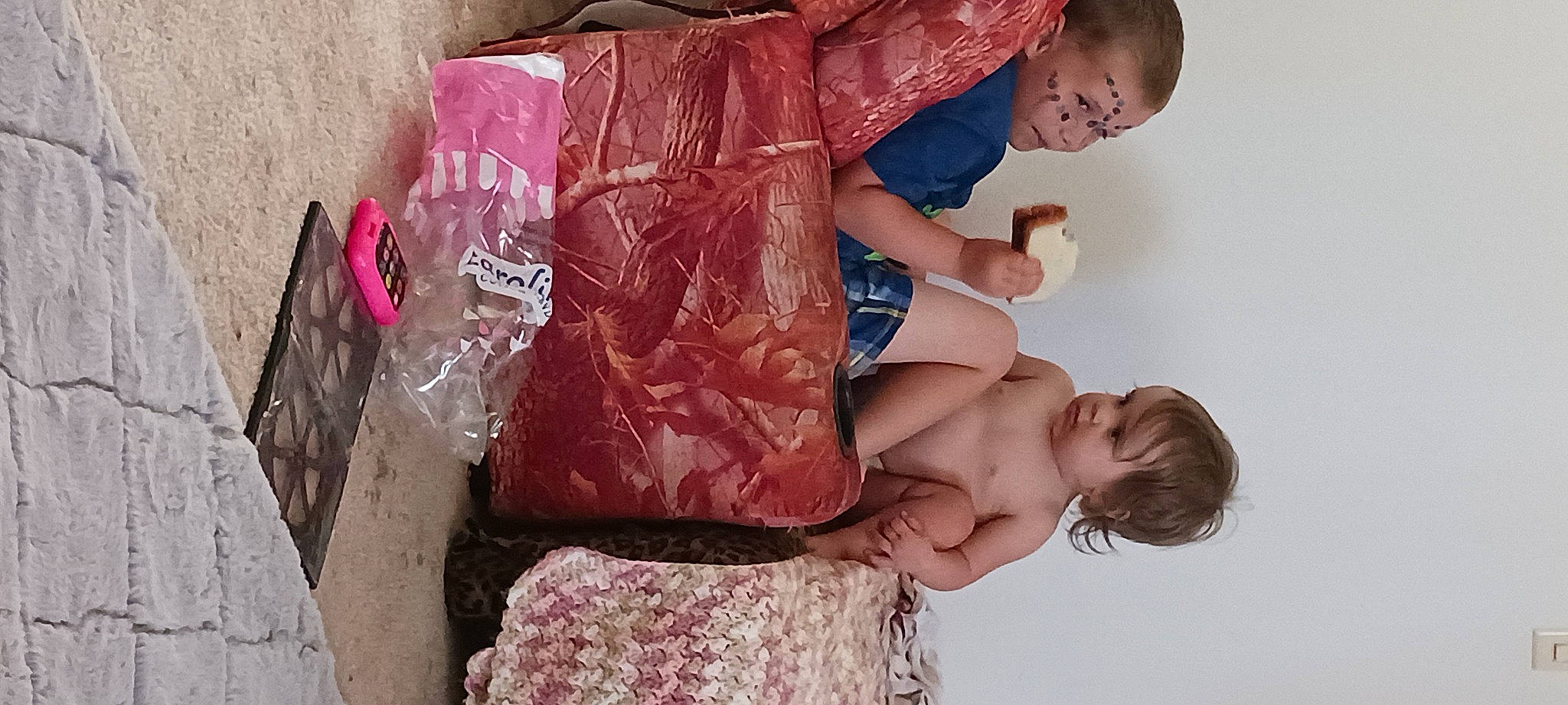 Chance is registered to the contest to win money with this photo: arm, baby_toddler_clothing, child, clothing, gesture, happy, human_body, joint, one_piece_garment, person, photograph, pink, red, shoulder, skin, sleeve, thigh, toddler, trunk, waist