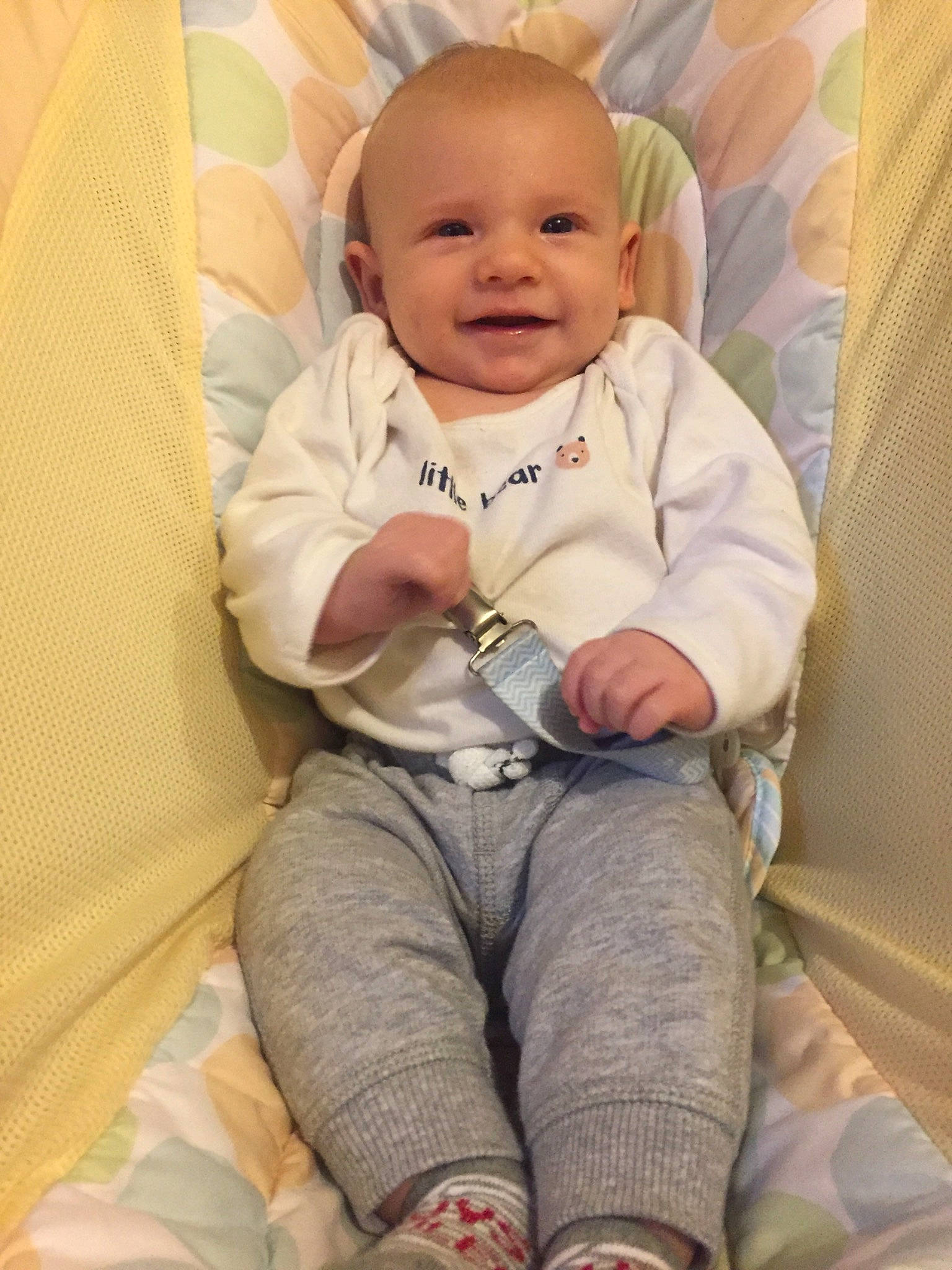 Bentlee is registered to the contest to win money with this photo: arm, baby_products, bedtime, cheek, child, day, ear, finger, infant, person, product, sitting, skin, smile, textile, toddler, trunk