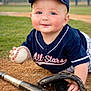athlete, baby, baseball, bat, blue_eyes, cap, child, cute, dirt, field, glove, grass, outdoor, playing, portrait, recreation, smiling, sports, team, uniform