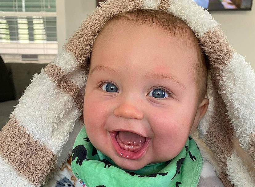 James joined the competition — help win amazing prizes! cheek, chin, ear, eye, eyebrow, facial_expression, fur_clothing, happy, head, human, human_body, iris, lip, mouth, nose, outerwear, person, skin, smile, textile