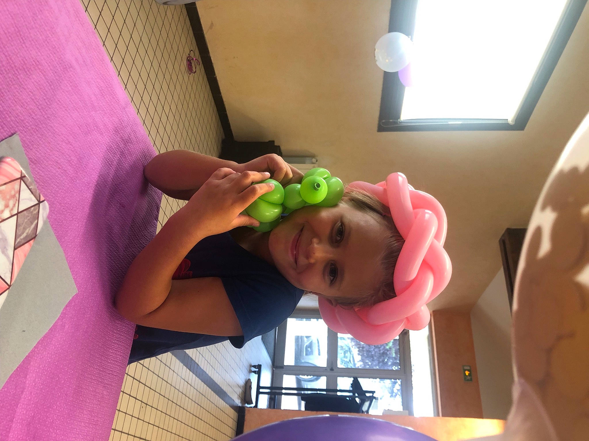 Axelle participe au concours pour gagner de l'argent avec cette photo : animation, baby, baby_products, child, finger, fun, happy, joy, leisure, linens, magenta, mouth, party, person, pink, play, purple, room, smile, thumb