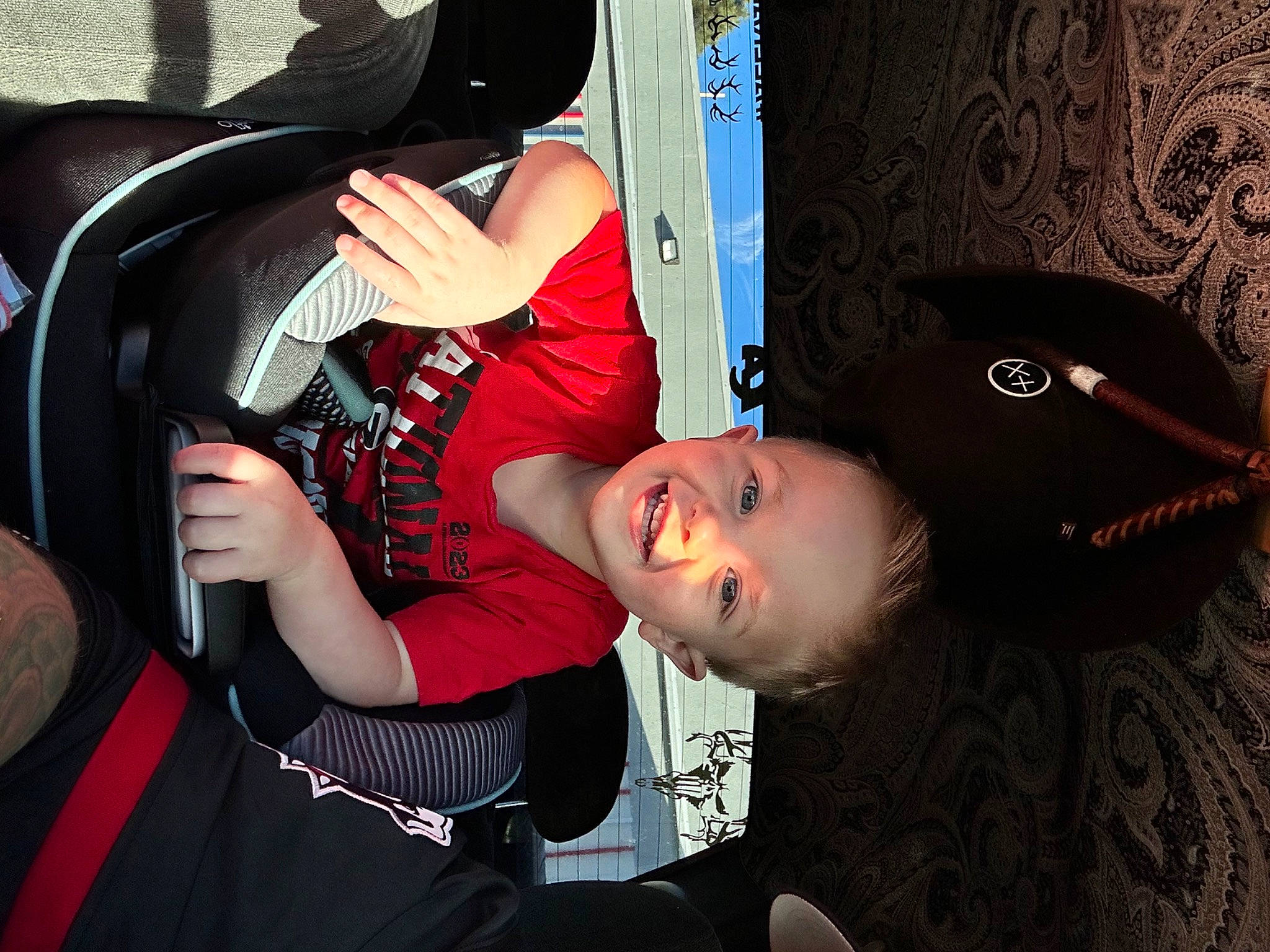 Colton joined the competition — help win amazing prizes! audio_equipment, auto_part, automotive_design, automotive_lighting, automotive_wheel_system, black_hair, car_seat, child, cool, family_car, fashion_accessory, flash_photography, fun, joy, luxury_vehicle, motor_vehicle, mouth, person, product, steering_wheel