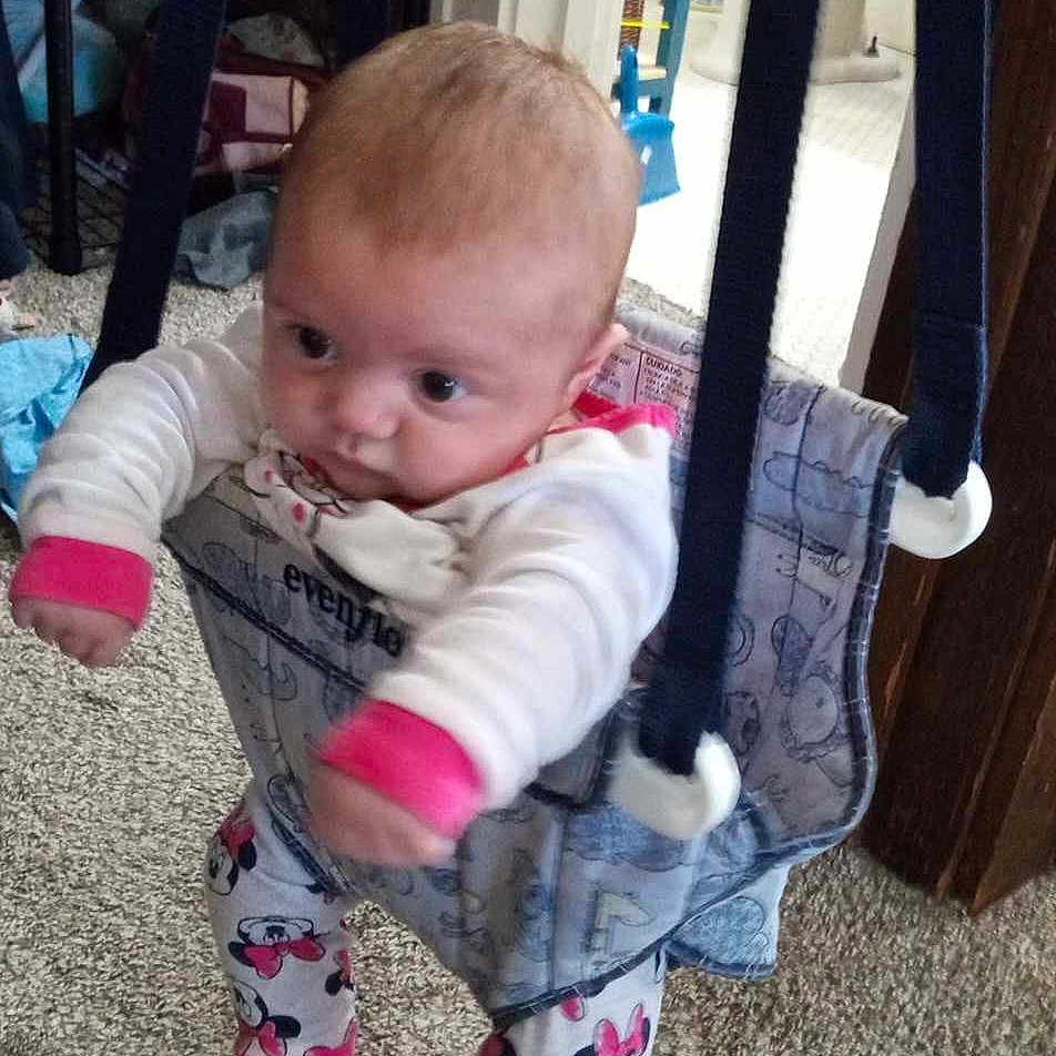 Anaiah is registered to the contest to win money with this photo: baby, clothing, costume, face, furniture, head, jeans, outdoorplayarea, outdoors, pants, person, photography, playarea, portrait, quilt, shorts, sitting, standing, swing, toy