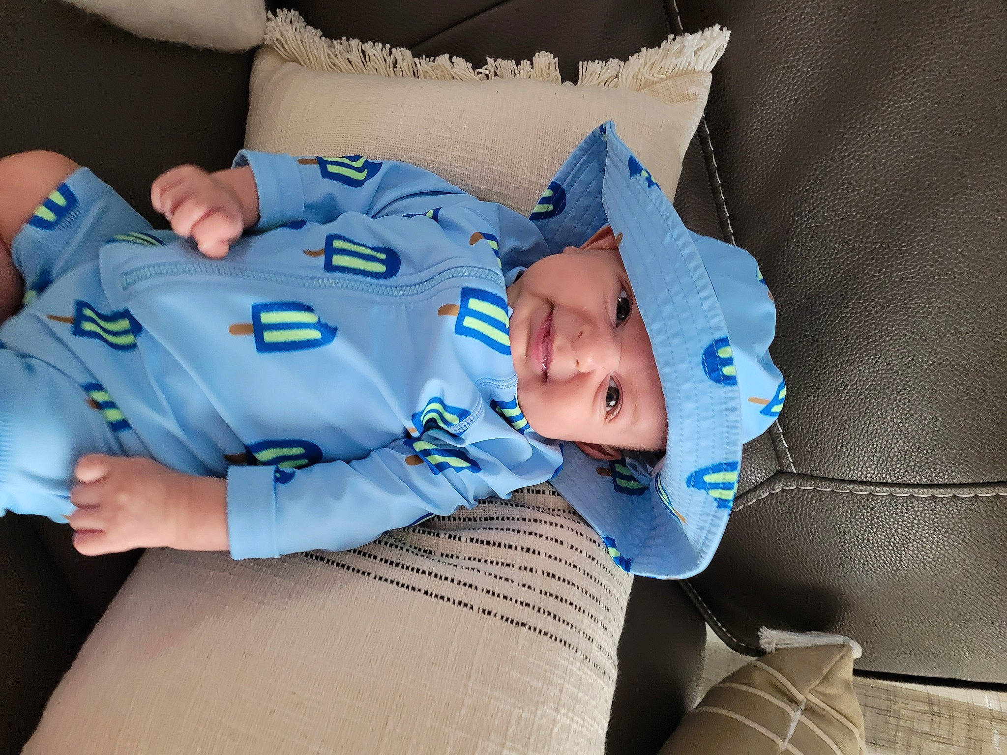 Adam joined the competition — help win amazing prizes! baby, baby_products, baby_sleeping, baby_toddler_clothing, child, comfort, couch, elbow, electric_blue, happy, headwear, human_body, linens, mouth, nap, person, room, sitting, sleeve, t_shirt