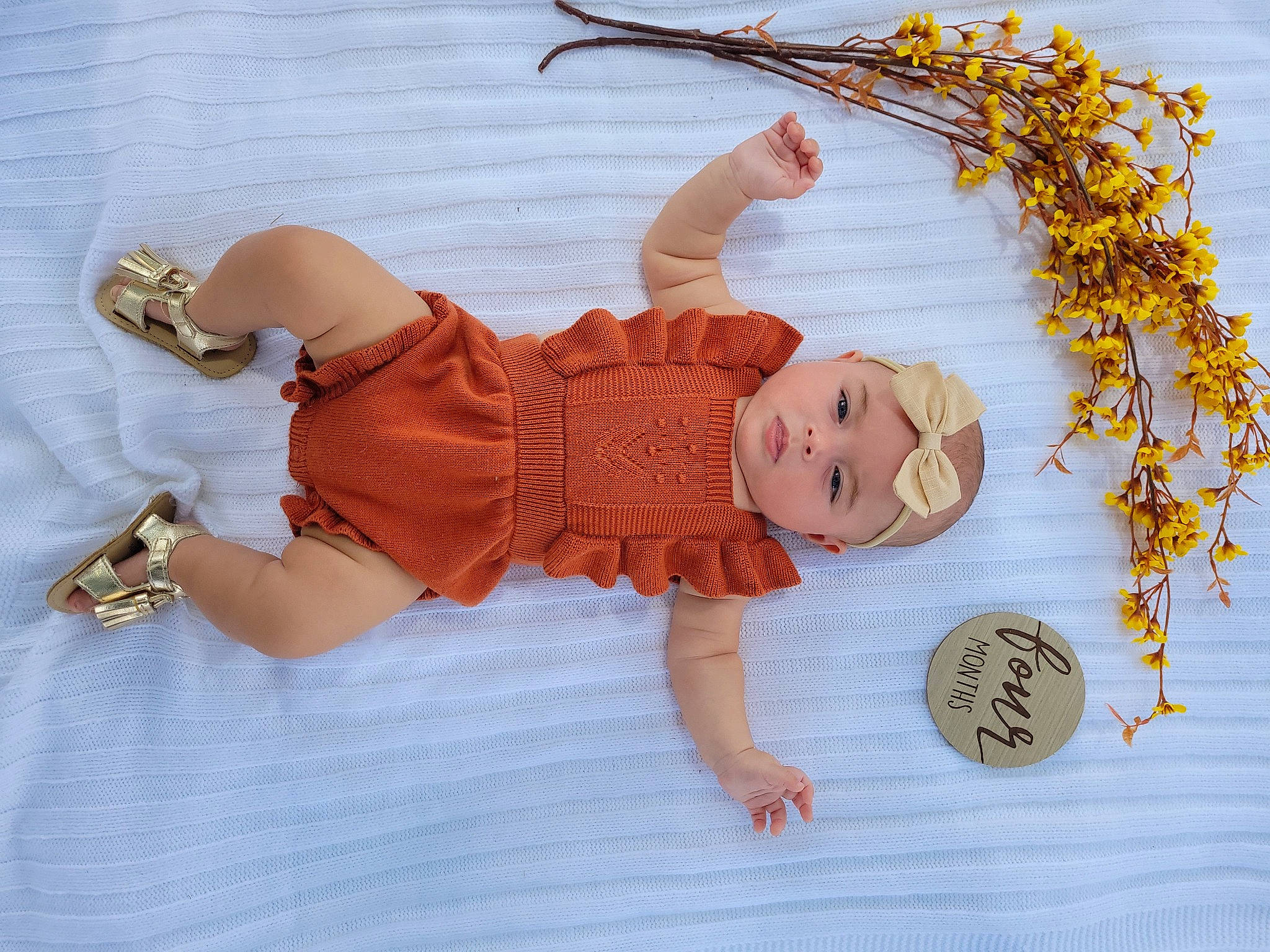 Jamie joined the competition — help win amazing prizes! baby, baby_products, baby_toddler_clothing, child, craft, doll, fashion_accessory, finger, happy, headwear, jewellery, pattern, peach, person, plant, sock, toddler, twig, wood, wrist