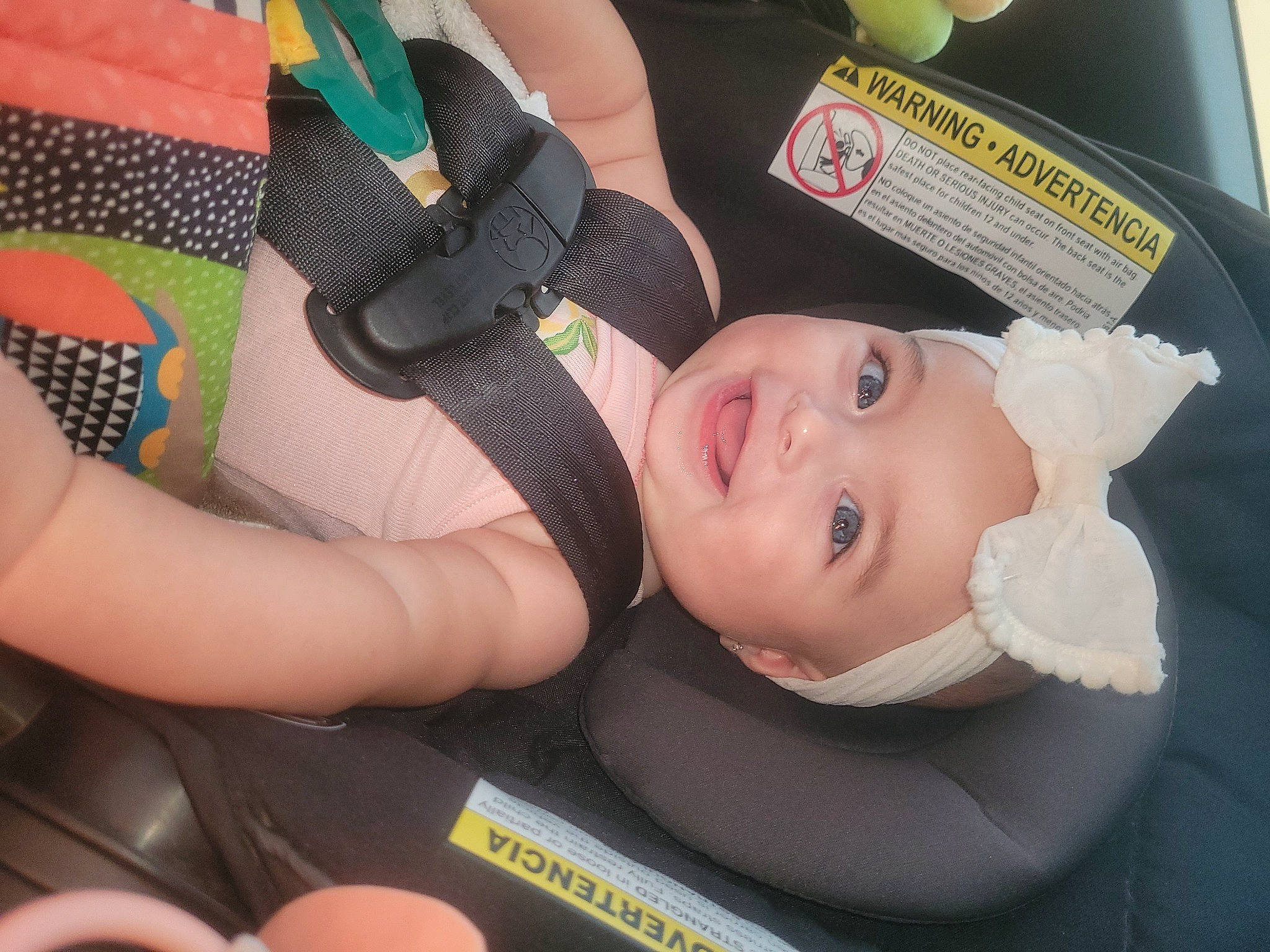 Jamie is registered to the contest to win money with this photo: auto_part, baby, baby_carriage, baby_in_car_seat, baby_products, baby_safety, baby_toddler_clothing, car_seat, child, comfort, fashion_accessory, fun, headwear, human_leg, joy, nail, person, personal_protective_equipment, sitting, skin