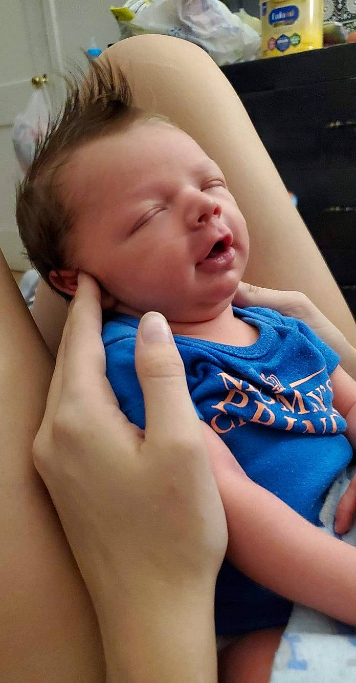 Zayden joined the competition — help win amazing prizes! arm, baby, cheek, child, chin, ear, face, finger, gesture, hand, mouth, nail, nap, neck, nose, person, skin, sleep, thumb, toddler