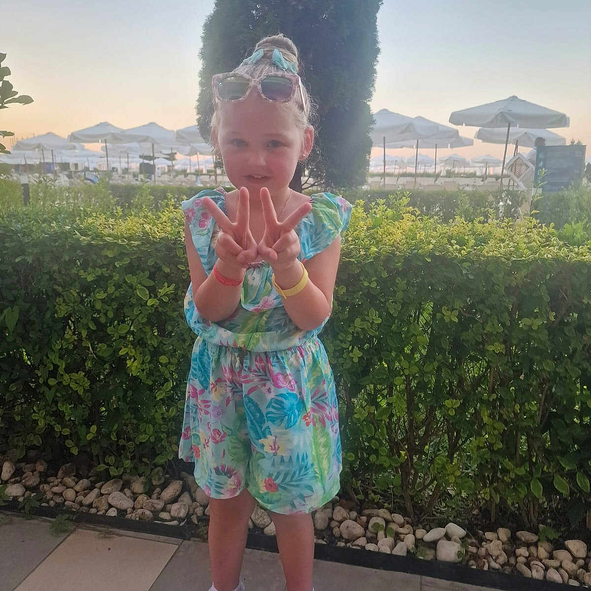 Kayla-Shay joined the competition — help win amazing prizes! child, clothing, face, female, girl, hair, head, herbal, herbs, person, photography, plant, portrait, racket, shorts, sleeve, sport, standing, tennis, tennisracket