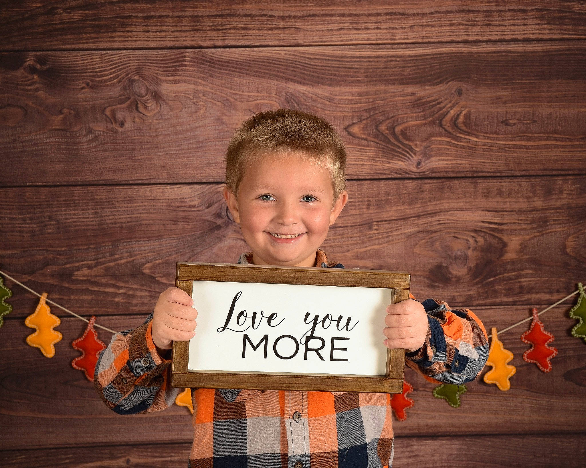 Bently is registered to the contest to win money with this photo: child, eye, face, font, fun, handwriting, happy, hardwood, head, joy, line, orange, person, photo_caption, poster, rectangle, sky, smile, sunset, t_shirt
