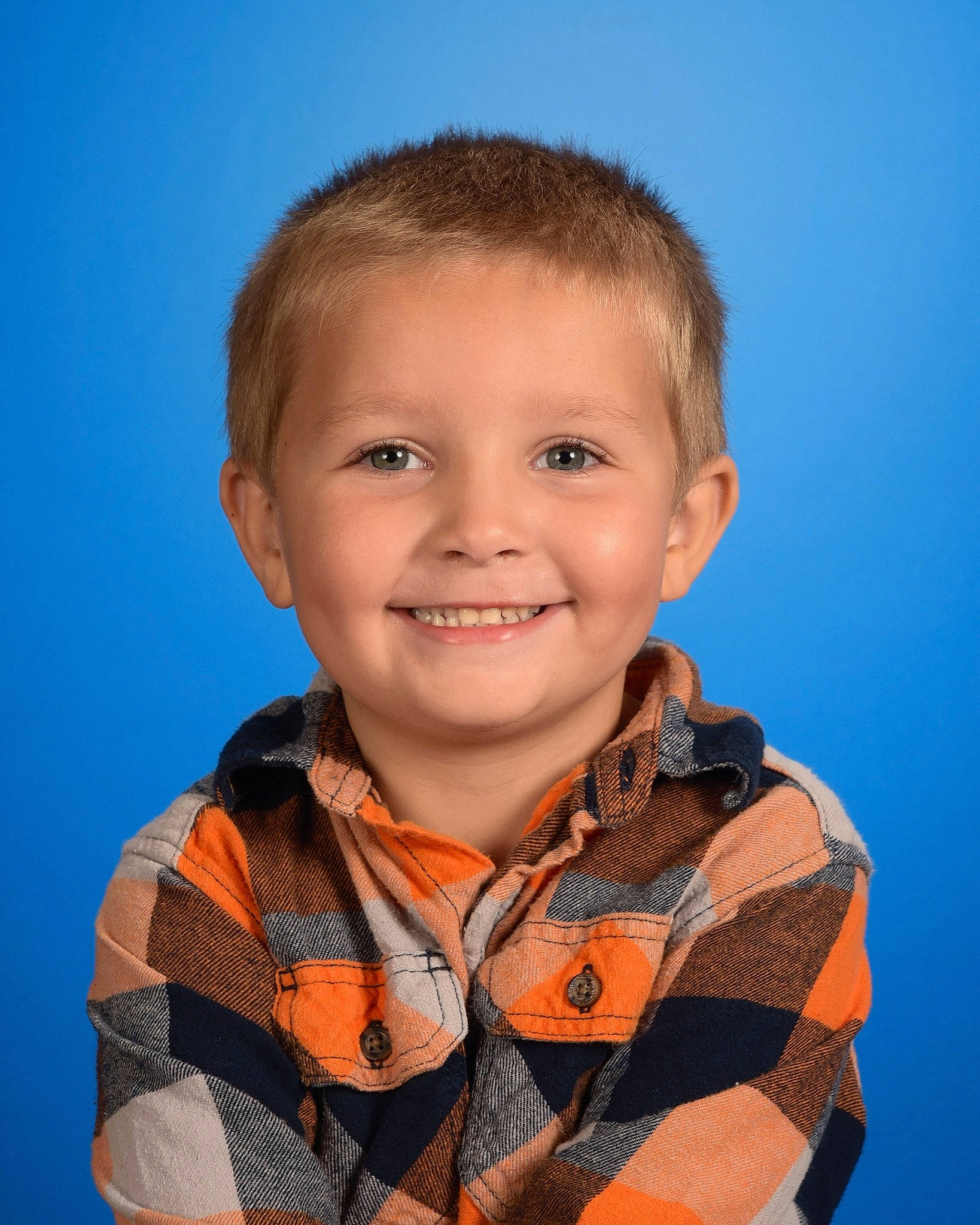 Bently is registered to the contest to win money with this photo: cheek, child, collar, electric_blue, eye, flash_photography, forehead, fun, hair, happy, high_visibility_clothing, iris, joy, lifejacket, nose, pattern, person, personal_protective_equipment, sky, sleeve