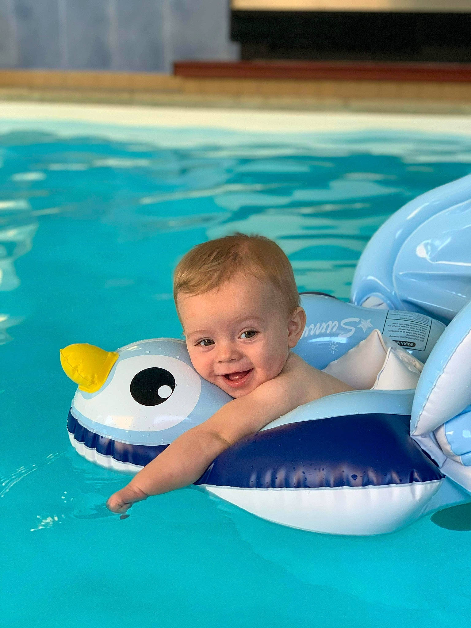 Mael participe au concours pour gagner de l'argent avec cette photo : aqua, azure, baby, baby_float, baby_products, bathing, blue, child, fun, happy, leisure, person, personal_protective_equipment, product, recreation, smile, summer, swimming_pool, toddler, water