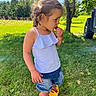 Lilah is registered to the contest to win money with this photo: child, clothing, face, female, footwear, girl, grass, head, nature, outdoors, pants, park, person, photography, plant, portrait, shorts, summer, tree, vegetation