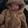 Miguel joined the competition — help win amazing prizes! baby, sleeping, hoodie, fuzzy, brown, cute, infant, clothing, warm, zipper, pocket, blanket, soft, child, face, portrait, cozy, indoors, resting, cute_outfit