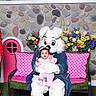 Jaliyah is registered to the contest to win money with this photo: baby, child, person, costume, bunny, bench, pink, polka_dot, cushion, flowers, smile, indoor, decor, grass, happy, toy, holiday, celebration, cute, playful