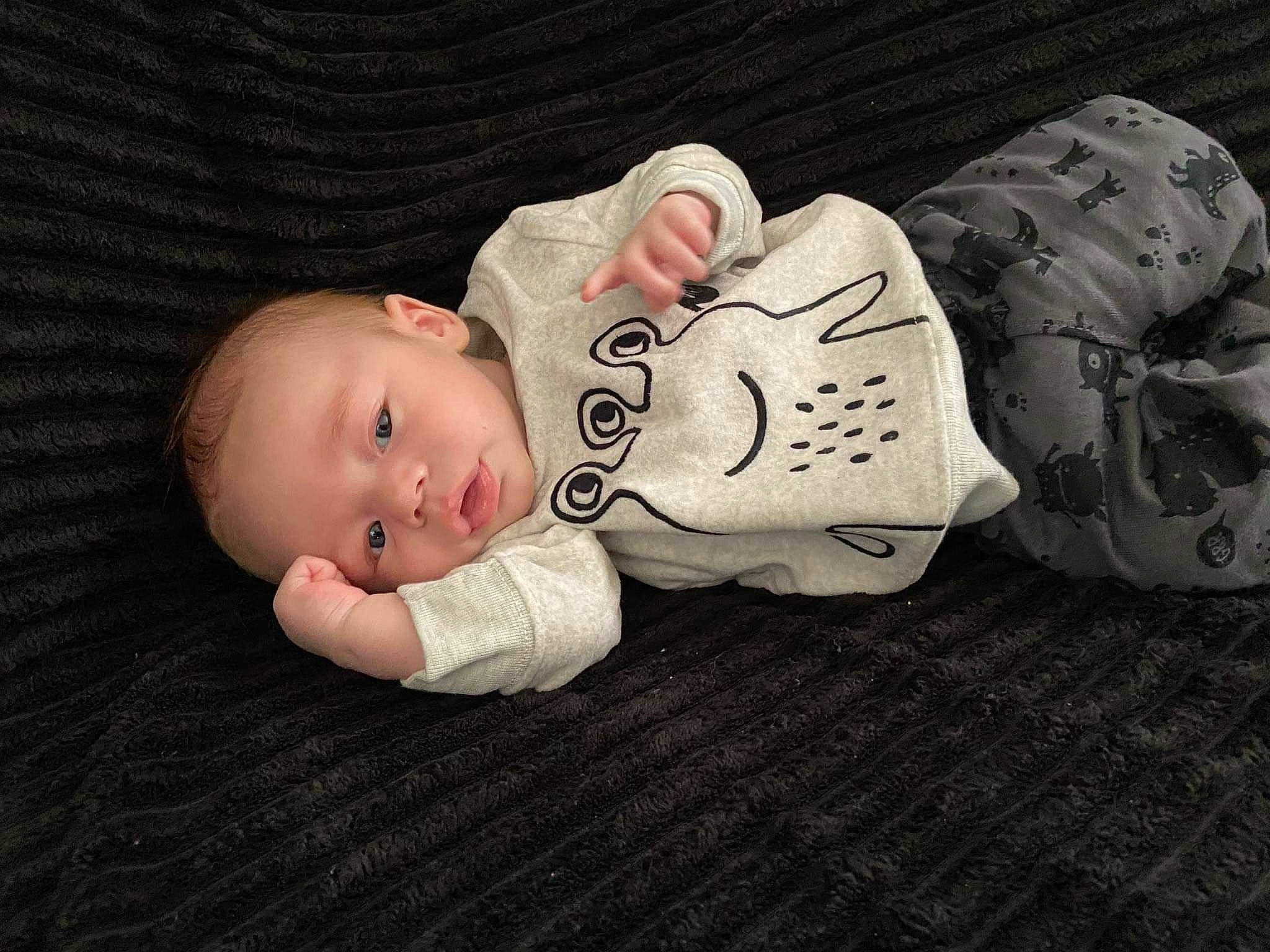 Warren is registered to the contest to win money with this photo: baby, bedtime, cheek, child, head, person, product, skin, toddler