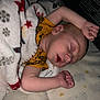 Finnegan joined the competition — help win amazing prizes! baby, sleeping, blanket, yellow_shirt, infant, cozy, peaceful, bed, pajamas, child, cute, resting, soft, indoor, portrait, newborn, clothing, hand, face, sleep