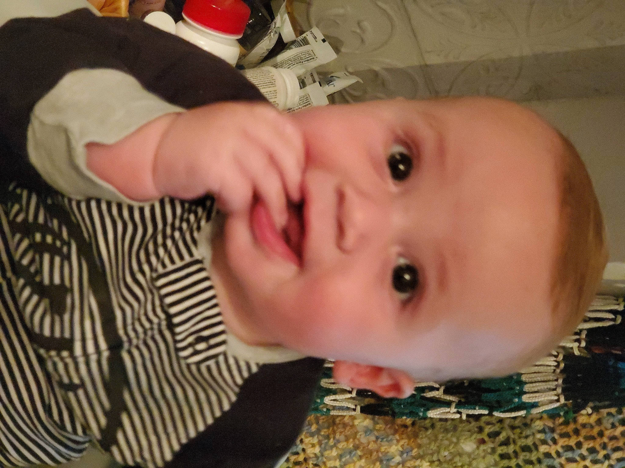 Atlas is registered to the contest to win money with this photo: baby, baby_products, baby_toddler_clothing, cheek, child, chin, eye, eyebrow, eyelash, face, fun, happy, iris, lip, mouth, nose, pattern, person, skin, toddler