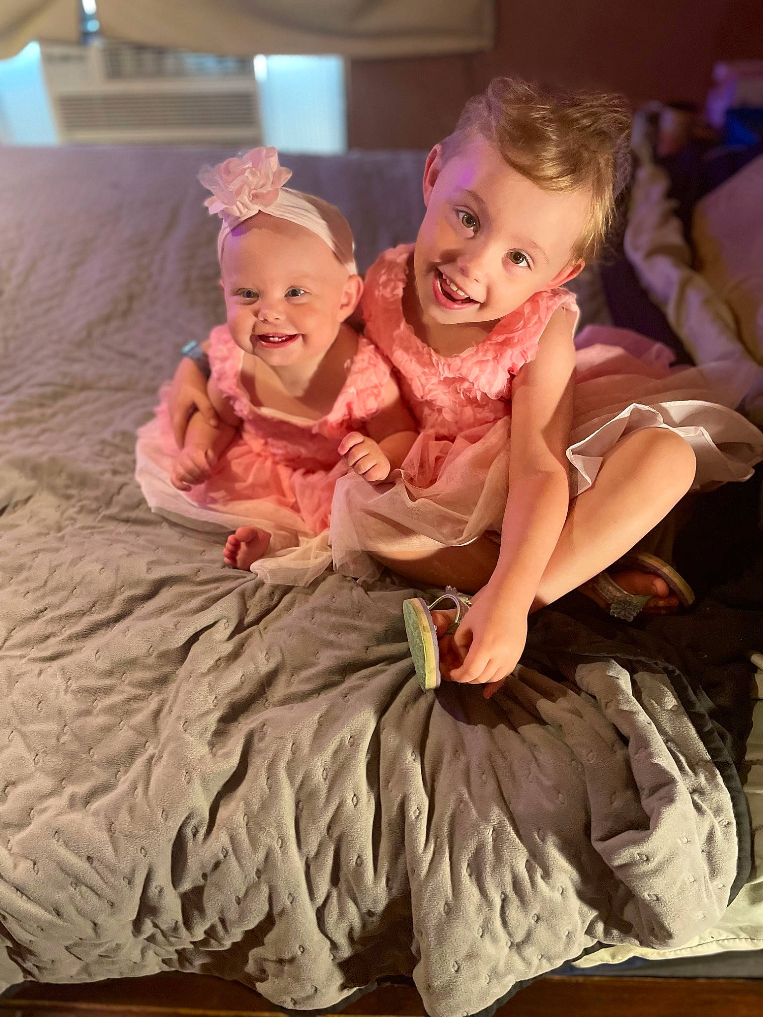 August joined the competition — help win amazing prizes! baby, baby_toddler_clothing, child, comfort, event, fashion, fashion_accessory, fashion_design, flooring, fun, happy, headpiece, joy, magenta, peach, person, pink, ruffle, sitting, smile