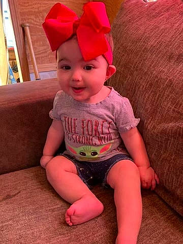 Kenzleigh joined the competition — help win amazing prizes! baby, baby_toddler_clothing, cap, chin, costume_hat, eye, face, hair, happy, head, headgear, headwear, human_body, knee, lip, person, pink, shorts, sleeve, smile