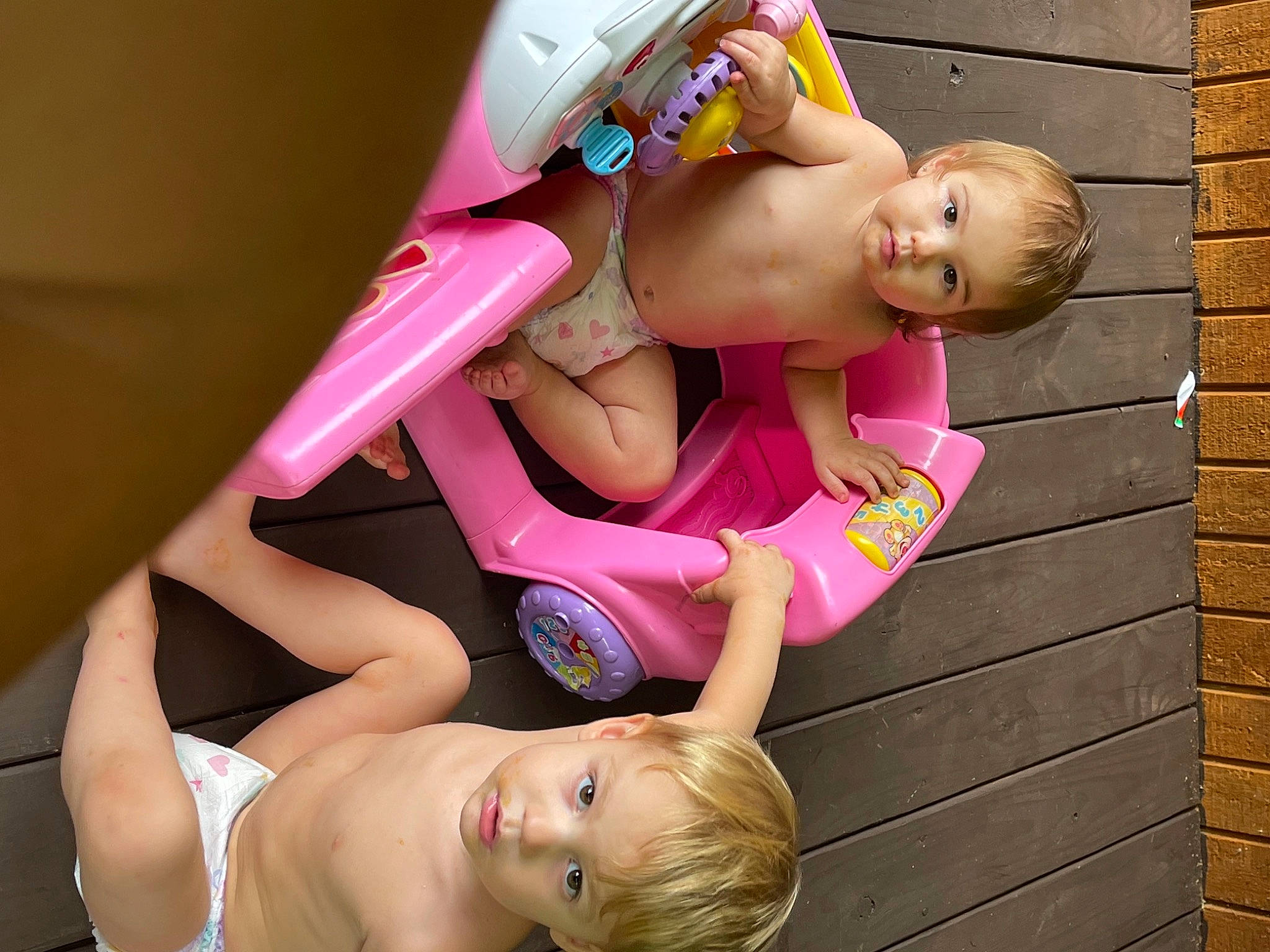 Kenzleigh is registered to the contest to win money with this photo: baby_toddler_clothing, chest, child, eye, face, facial_expression, finger, fun, hairstyle, happy, head, leg, leisure, muscle, person, pink, red, skin, thigh, toddler