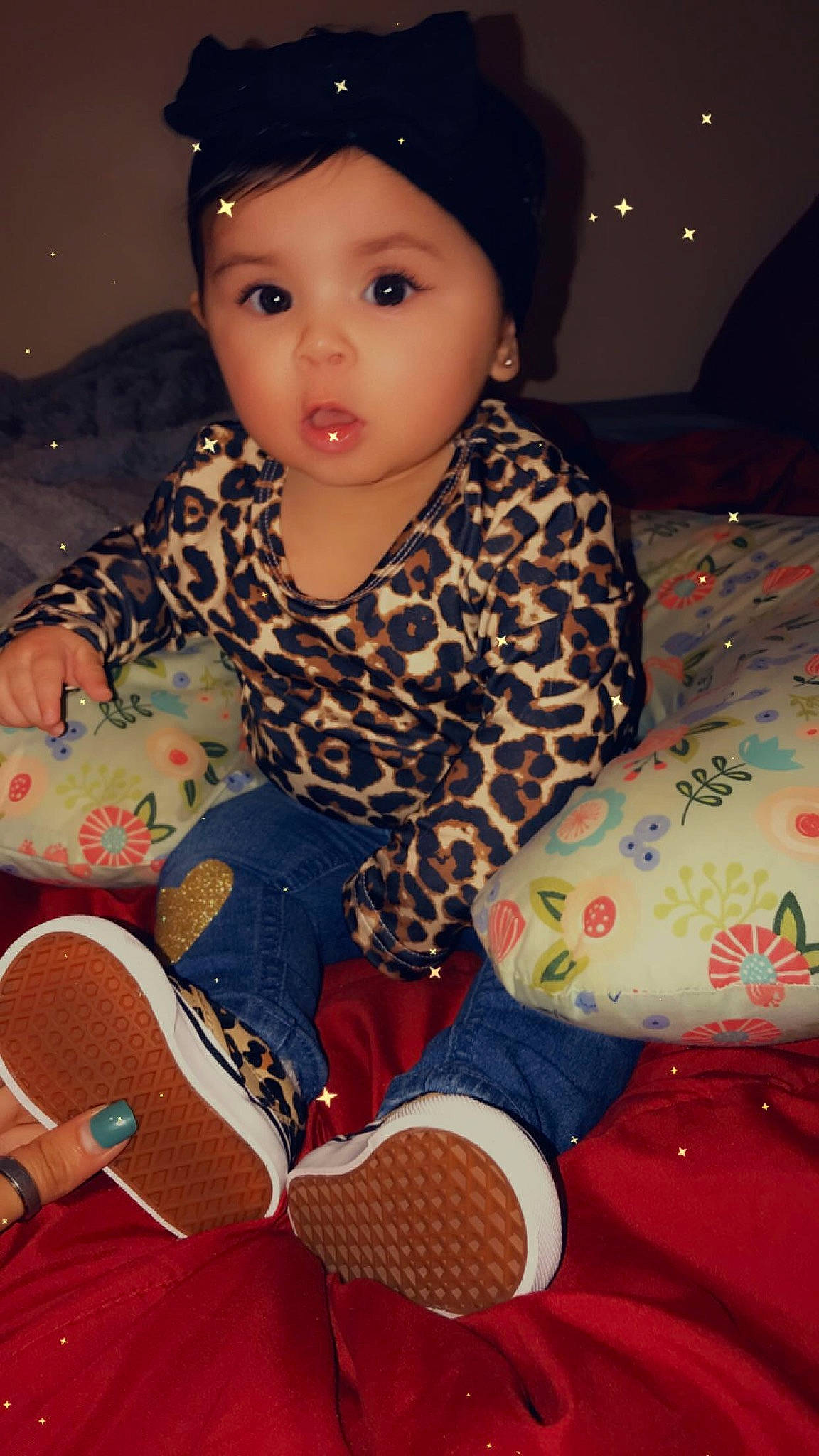 Xia is registered to the contest to win money with this photo: baby, cheek, child, cool, headwear, person, sitting, skin, smile, surprise, toddler