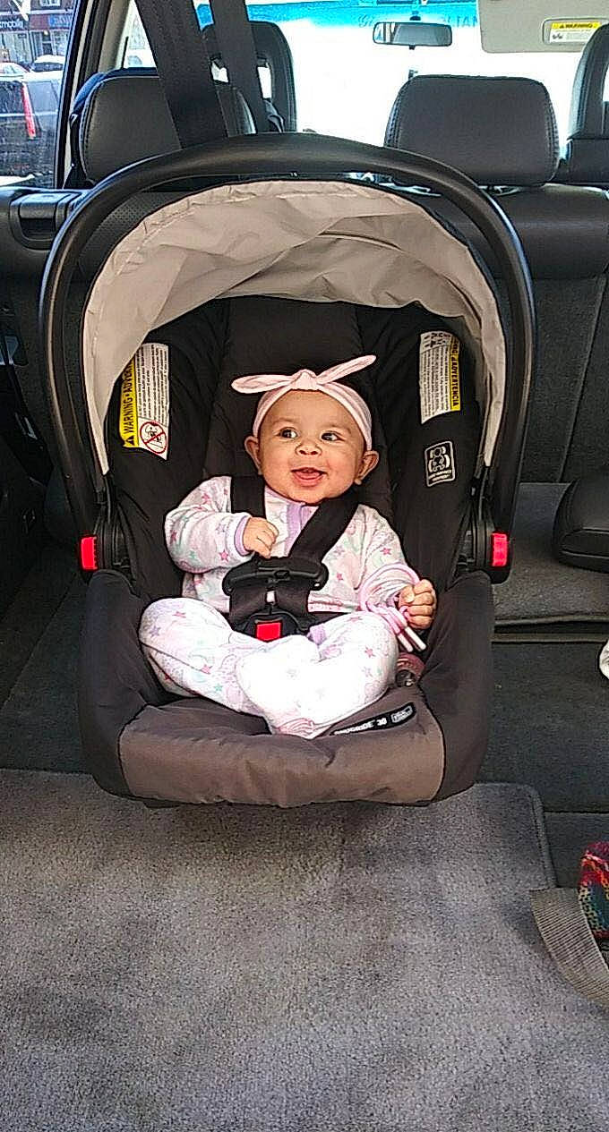 Xia is registered to the contest to win money with this photo: auto_part, baby_carriage, baby_in_car_seat, baby_products, car_seat, car_seat_cover, child, headwear, person, product, toddler