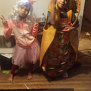 Daleah is registered to the contest to win money with this photo: accessories, bag, child, clothing, costume, dress, face, fashion, female, formalwear, girl, gown, handbag, hat, head, person, photography, portrait, skirt, wood