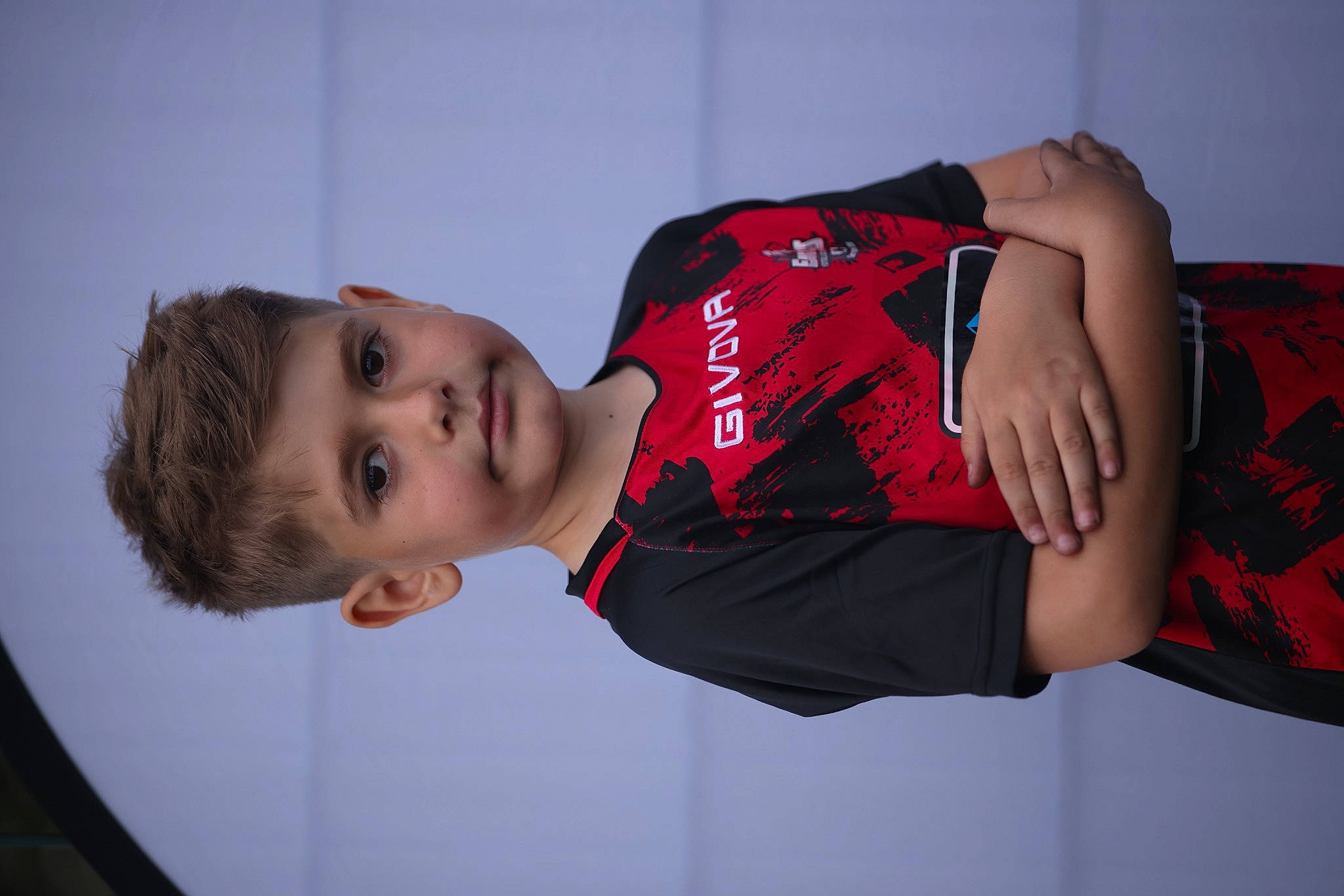 Yanis joined the competition — help win amazing prizes! carmine, child, comfort, elbow, fashion_accessory, flash_photography, human_leg, knee, lip, neck, pattern, person, shoulder, sitting, sleeve, t_shirt, thigh, toddler, trunk, waist