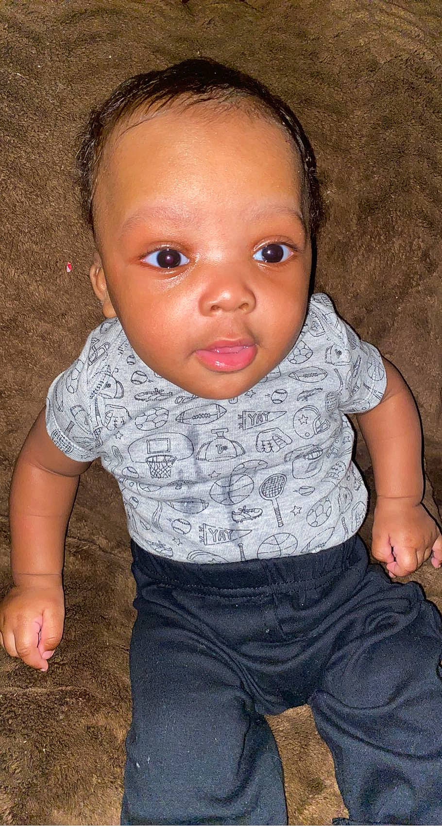 Jamari joined the competition — help win amazing prizes! baby_toddler_clothing, cheek, chin, eye, eyelash, face, facial_expression, finger, flash_photography, happy, head, iris, lip, mouth, neck, nose, person, pink, skin, sleeve