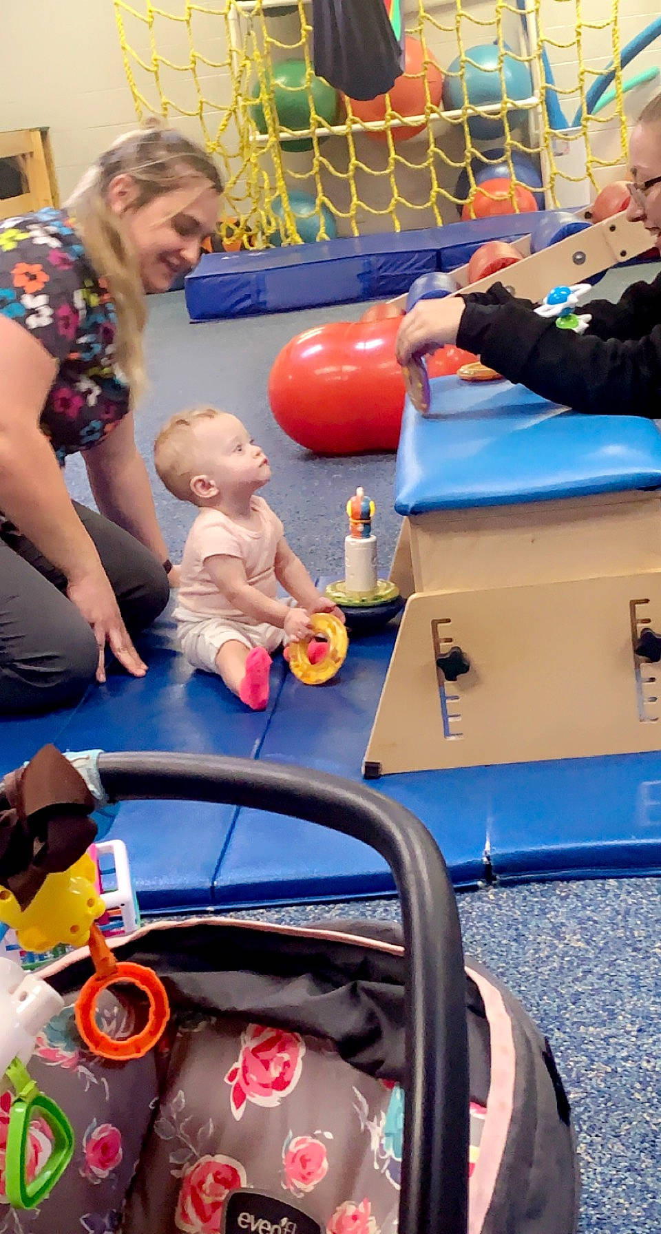 Raylynn is registered to the contest to win money with this photo: animation, baby, baby_products, blue, child, event, fun, joy, leisure, person, plastic, play, recreation, room, service, sitting, toddler, toy, vacation, yellow