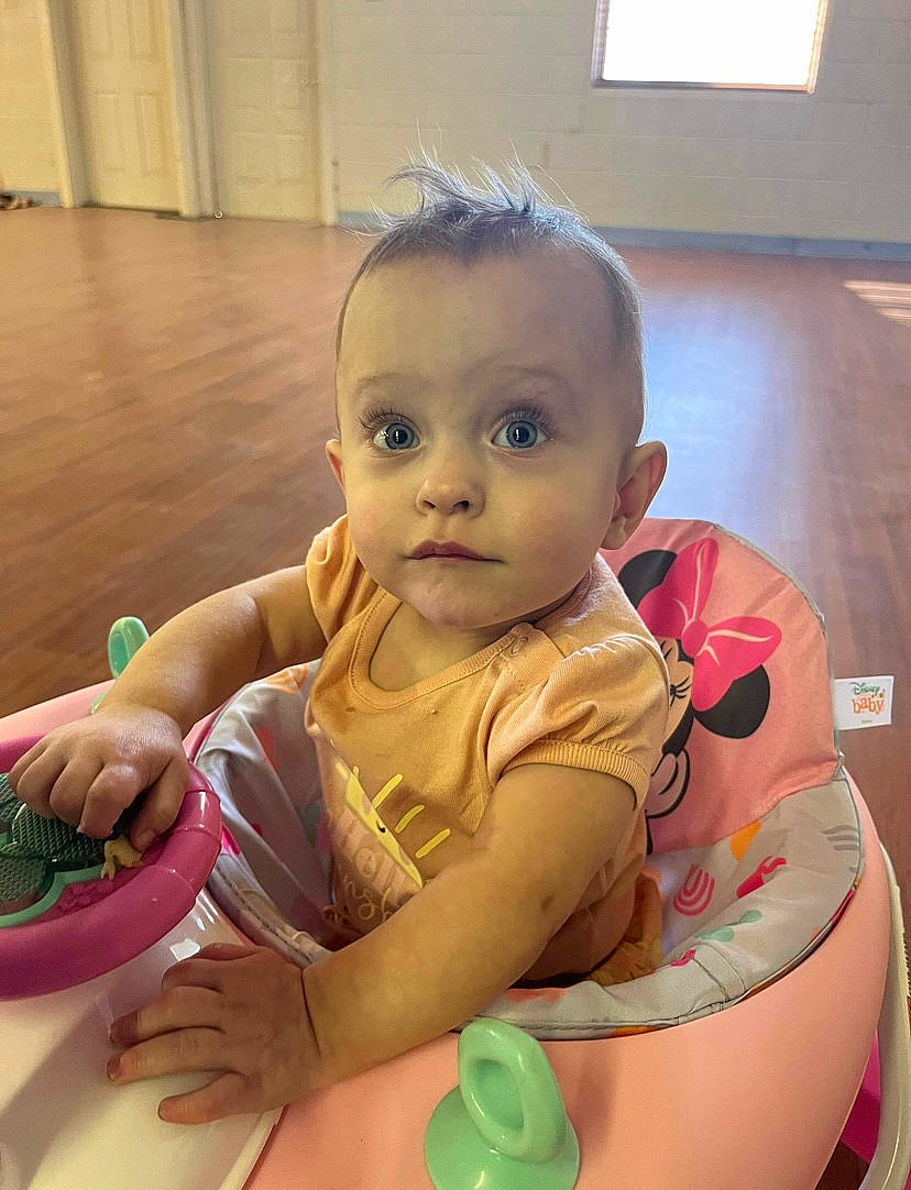Raylynn joined the competition — help win amazing prizes! baby, baby_grabbing_for_something, baby_products, baby_toddler_clothing, bib, cheek, child, comfort, finger, flooring, fun, happy, person, play, sitting, skin, thigh, thumb, toddler, window