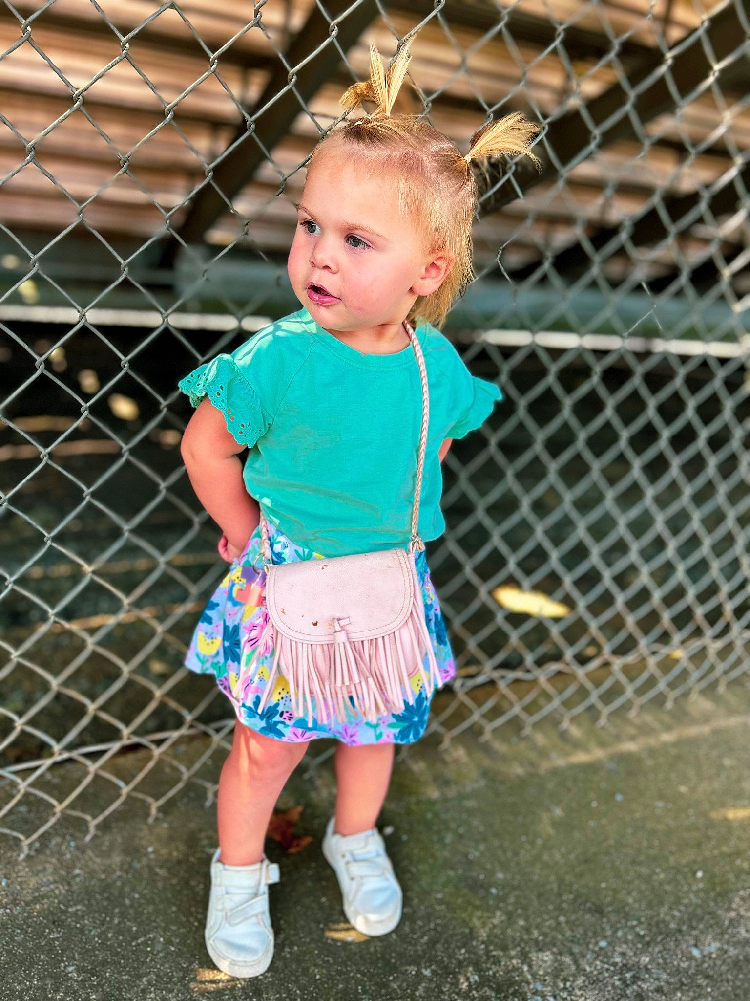 Madelyn is registered to the contest to win money with this photo: baby, baby_toddler_clothing, electric_blue, fence, fun, grass, happy, human_leg, leisure, mesh, pattern, people_in_nature, person, play, recreation, sleeve, toddler, tree, waist, water