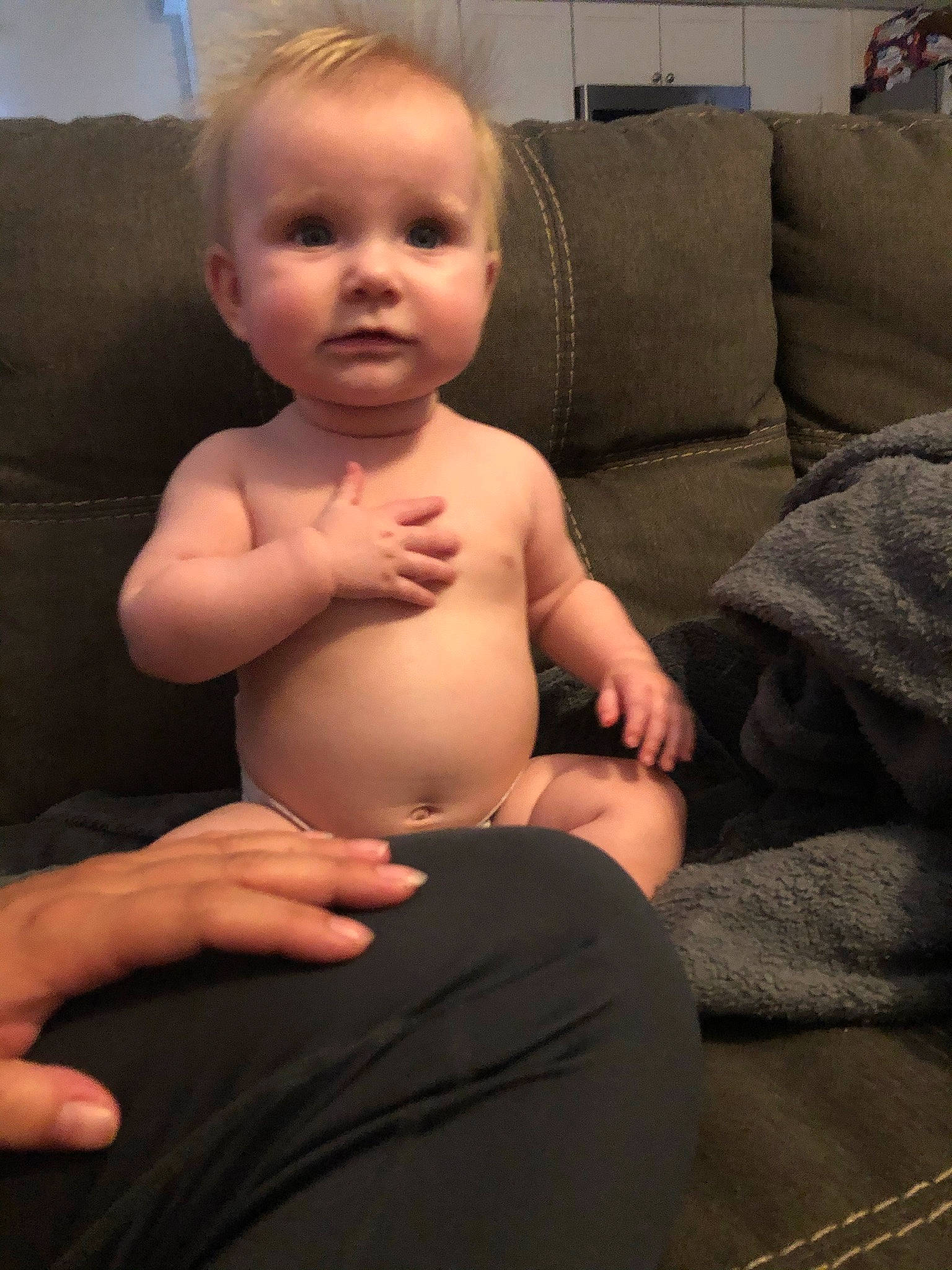 Crimson is registered to the contest to win money with this photo: arm, cheek, chest, comfort, couch, eye, eyelash, face, finger, gesture, hand, human_body, joint, lip, person, shoulder, skin, smile, stomach, thumb