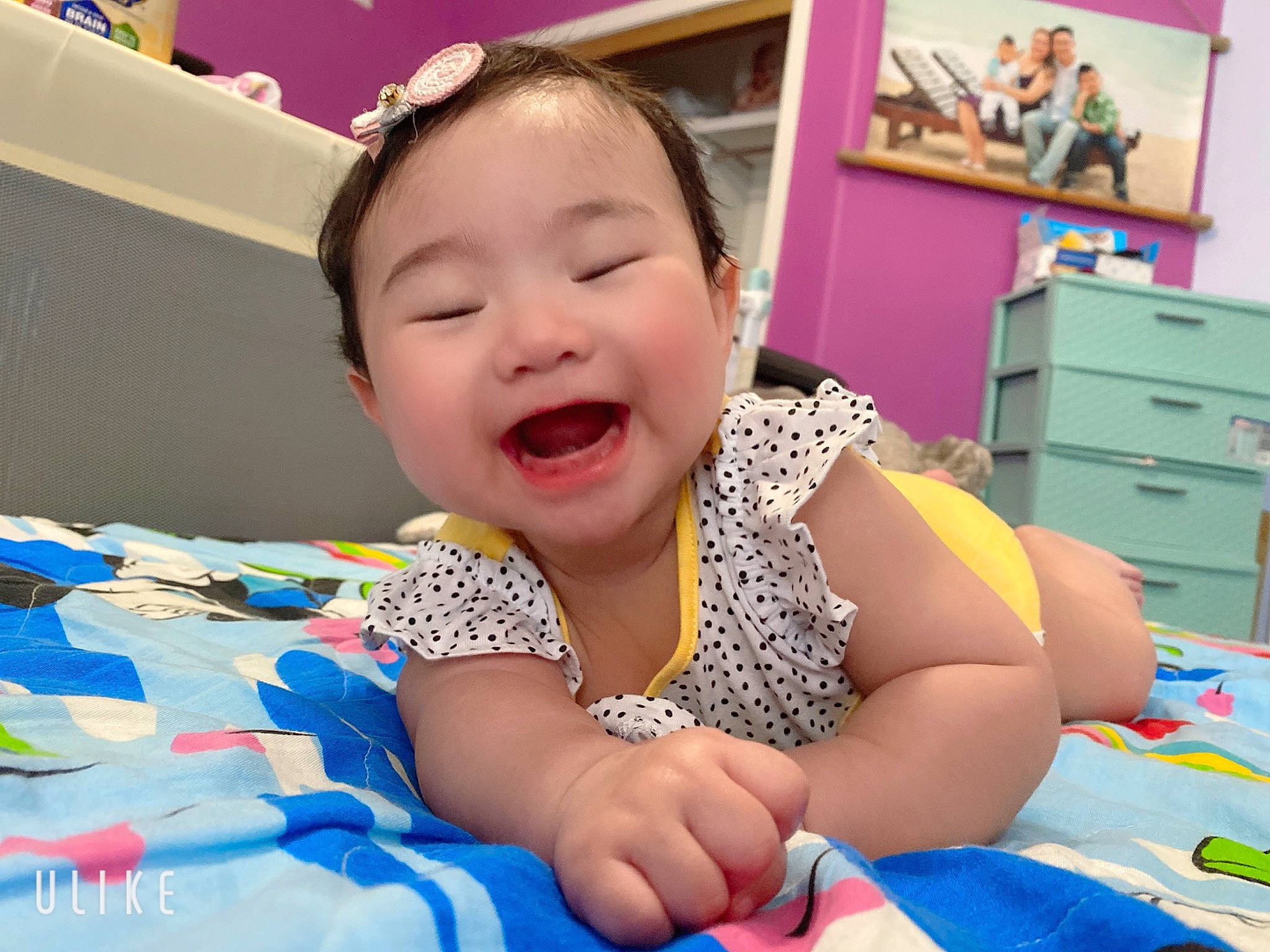 Holly joined the competition — help win amazing prizes! baby, birth, cheek, child, ear, face, facial_expression, fun, happy, head, mouth, nose, person, play, product, room, sitting, skin, smile, toddler