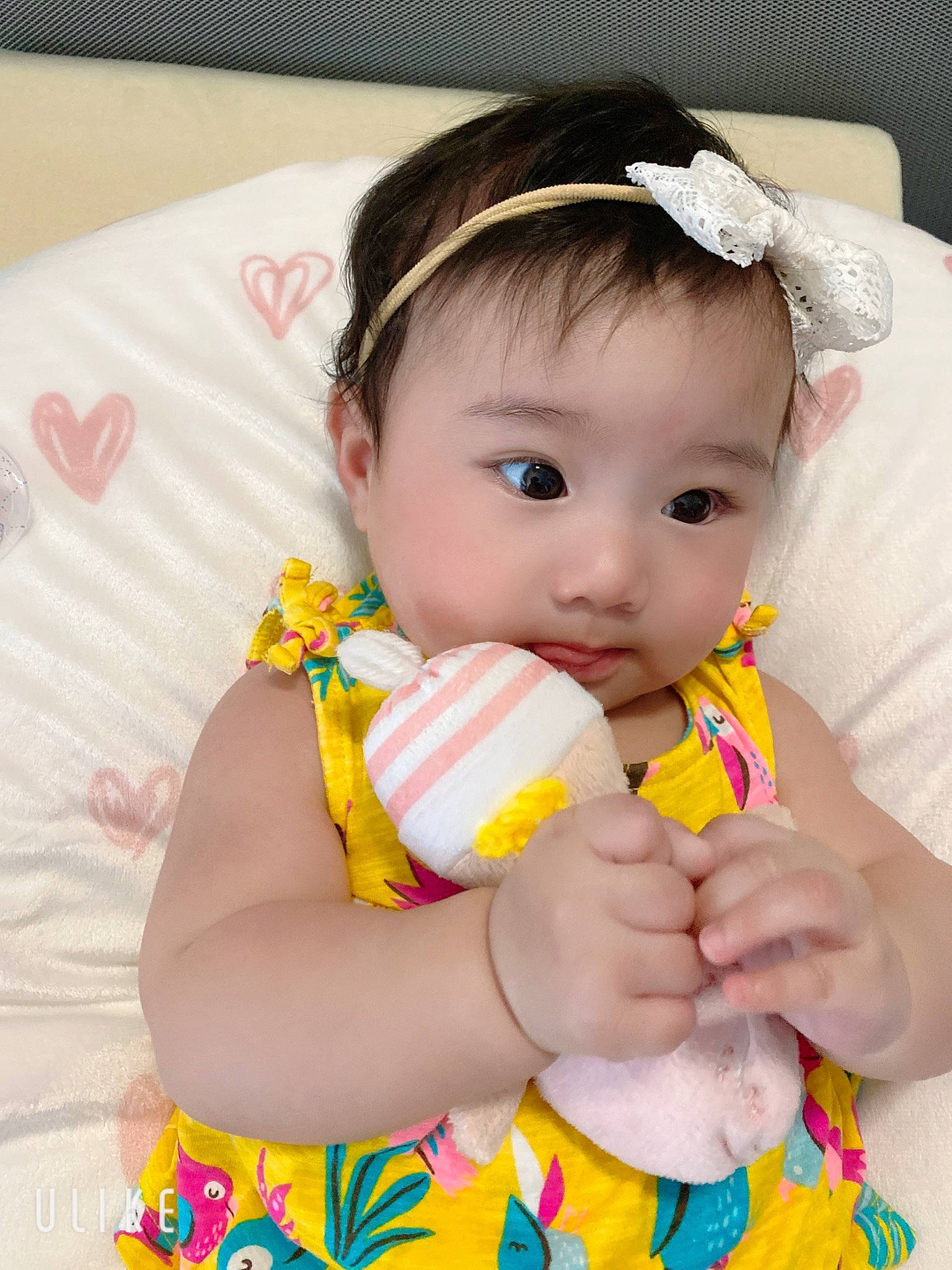Holly joined the competition — help win amazing prizes! baby, baby_products, baby_toddler_clothing, child, hair_accessory, headband, person, play, product, toddler, yellow