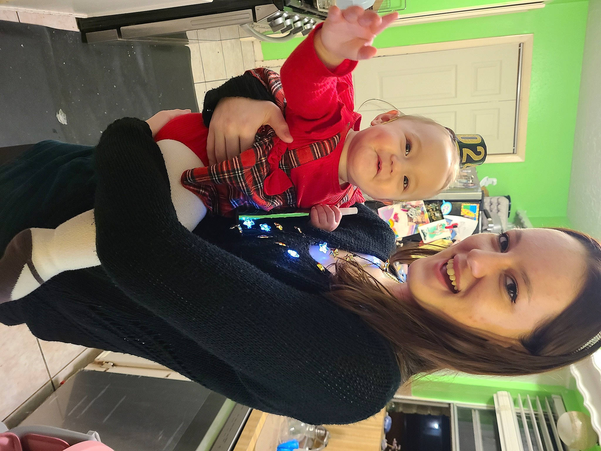 Emilee is registered to the contest to win money with this photo: baby, baby_toddler_clothing, chair, child, comfort, elbow, event, face, fun, happy, joy, knee, lap, leisure, person, room, smile, thigh, toddler