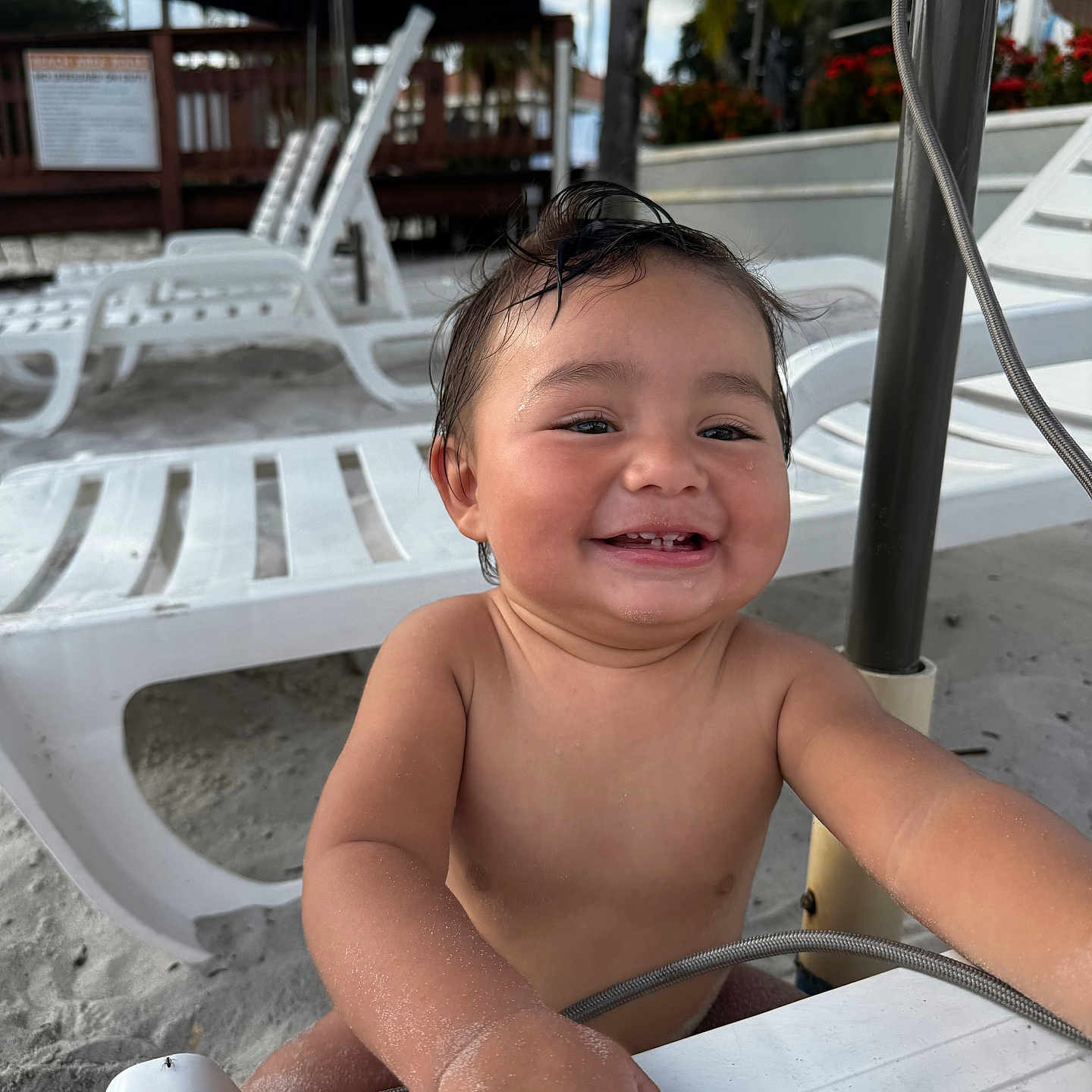 Ian Emmanuel joined the competition — help win amazing prizes! bare_chest, beach, child, closeup, fun, happy, holiday, lounge_chair, outdoor, palm_tree, playful, sand, smile, summer, sunny, sunshade, toddler, umbrella, vacation, water_droplets