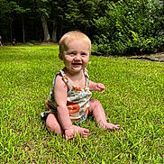 Ava-Lee joined the competition — help win amazing prizes! baby, child, grass, outdoor, greenery, smile, sunlight, nature, trees, bushes, happy, sitting, romper, blonde_hair, person, portrait, summer, cute, innocence, playful