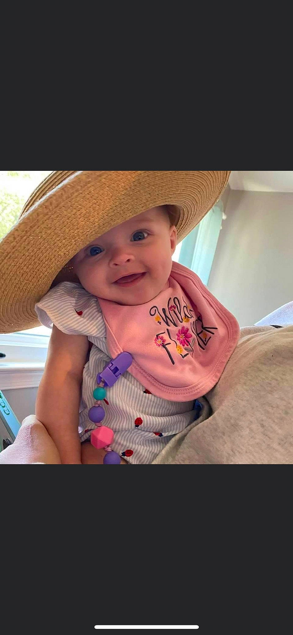 Maddie joined the competition — help win amazing prizes! baby, baby_toddler_clothing, cap, car_seat, child, comfort, cool, face, fun, happy, hat, headwear, joy, lip, magenta, person, pink, sitting, skin, smile