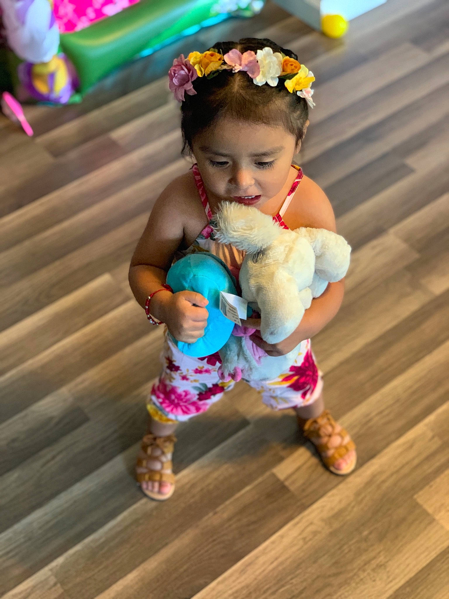 Tatianna is registered to the contest to win money with this photo: baby, beauty, child, costume, dress, floor, fun, hair_accessory, happy, headband, headgear, person, pink, play, skin, toddler, vacation
