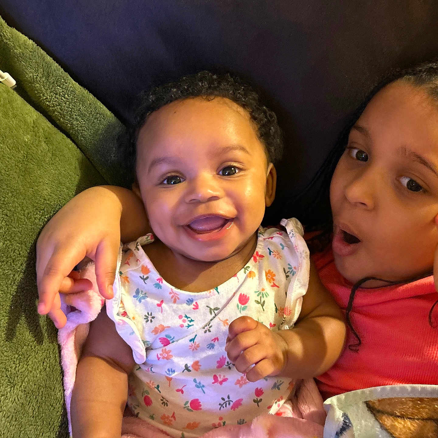 Shylia is registered to the contest to win money with this photo: baby, babylaughing, bodypart, clothing, couch, cushion, face, finger, furniture, hand, happy, head, homedecor, laughing, mouth, person, photography, portrait, smile, t_shirt