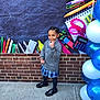 Evii is registered to the contest to win money with this photo: balloons, black_shoes, braided_hair, brick_wall, calculator, cardigan, child, colored_pencils, girl, notepad, outdoor, paperclips, peace_sign, plaid_skirt, push_pins, school_uniform, scissors, sidewalk, smiling, stationery