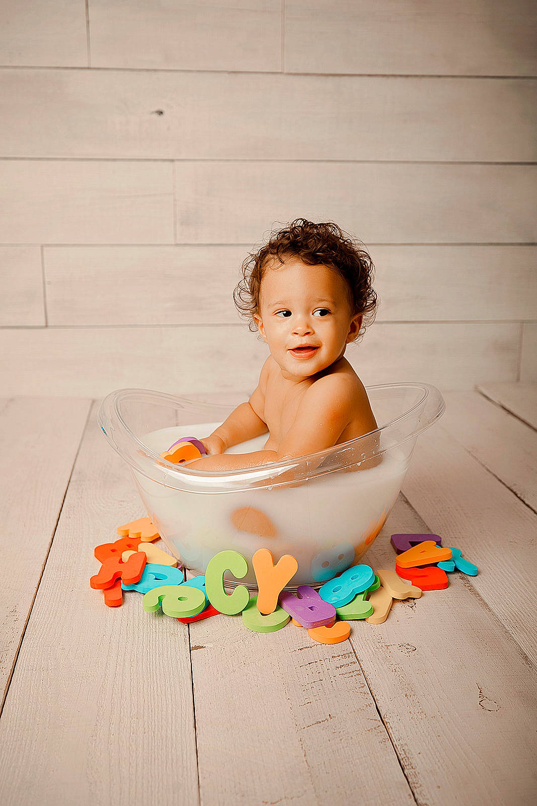 Cyrus is registered to the contest to win money with this photo: baby, baby_bathing, baby_playing_with_toys, baby_products, baby_toddler_clothing, barefoot, bathing, cheek, child, floor, flooring, foot, fun, happy, leisure, person, play, sitting, smile, toddler