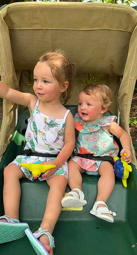 Hadley joined the competition — help win amazing prizes! baby_toddler_clothing, chair, cheek, child, eye, facial_expression, fun, hairstyle, happy, head, human_body, lap, leg, leisure, person, photograph, pink, product, shoe, skin