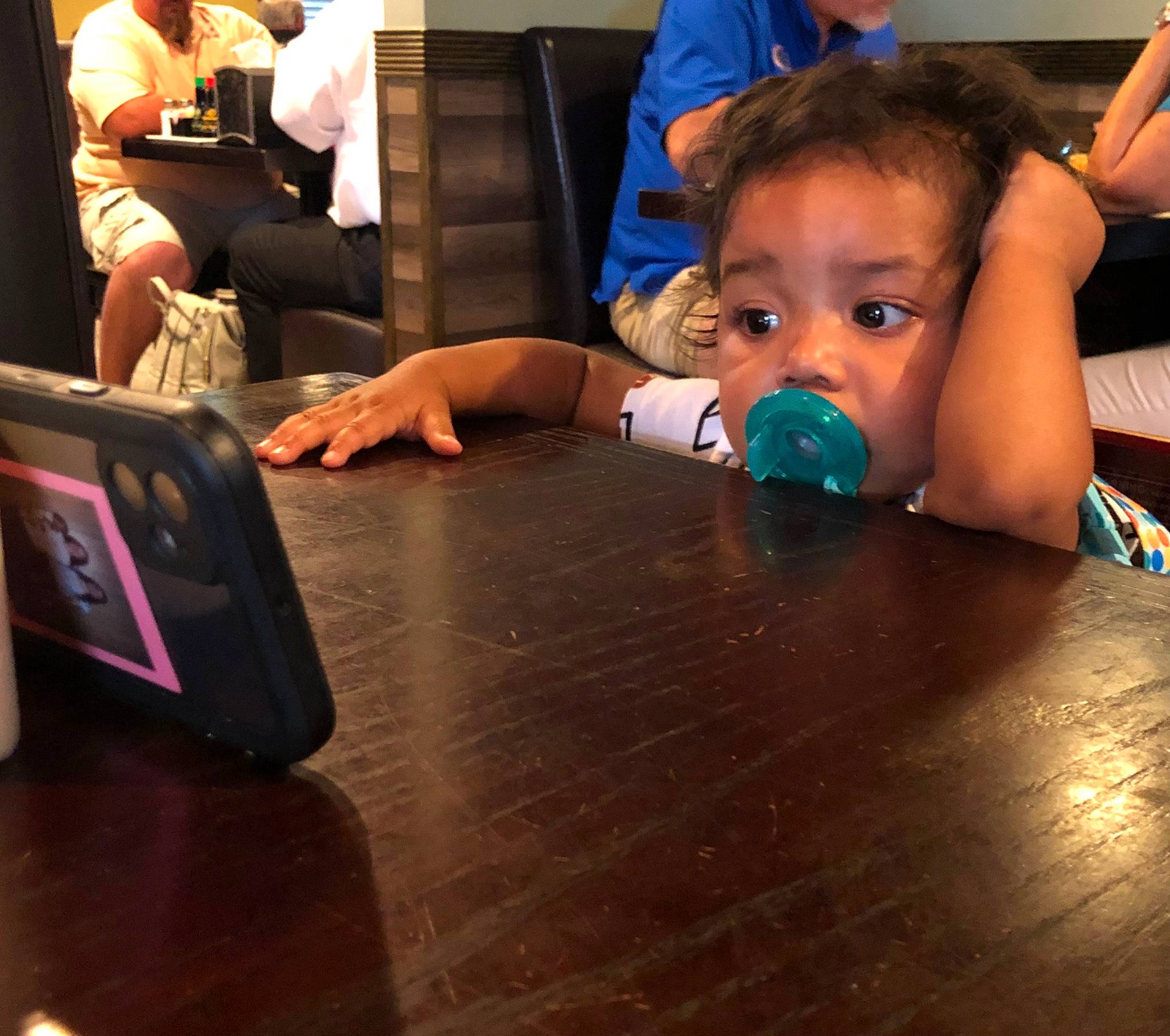 Caysen is registered to the contest to win money with this photo: arm, audio_equipment, child, event, eyelash, floor, flooring, fun, gadget, games, hand, happy, hardwood, indoor_games_and_sports, leisure, person, recreation, table, toddler, varnish