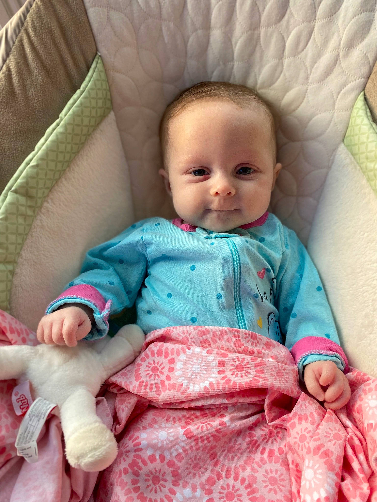 Allie joined the competition — help win amazing prizes! azure, baby, baby_toddler_clothing, cheek, child, chin, comfort, couch, eye, face, head, iris, linens, outerwear, person, pink, skin, sleeve, smile, textile