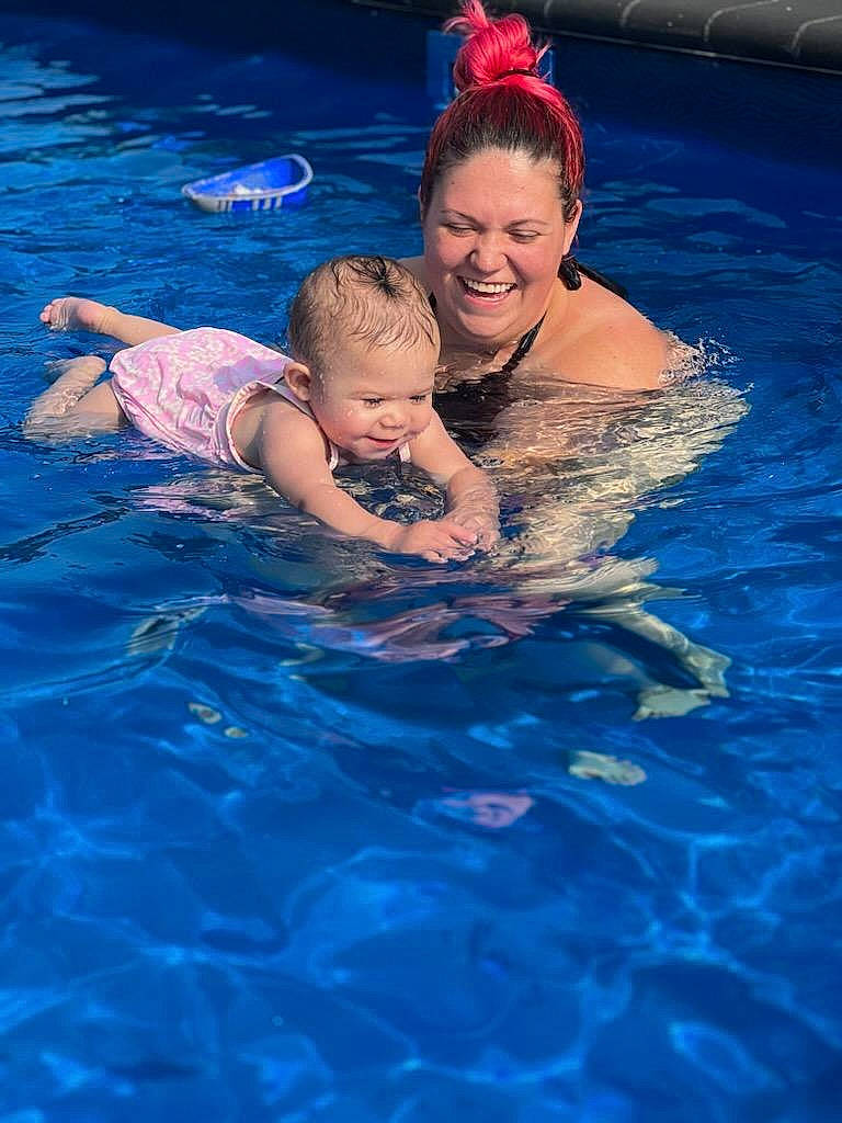 Ariah is registered to the contest to win money with this photo: azure, blue, child, electric_blue, event, fun, games, happy, joy, leisure, leisure_centre, person, personal_protective_equipment, recreation, smile, sports, swimmer, swimming_pool, swimwear, toddler