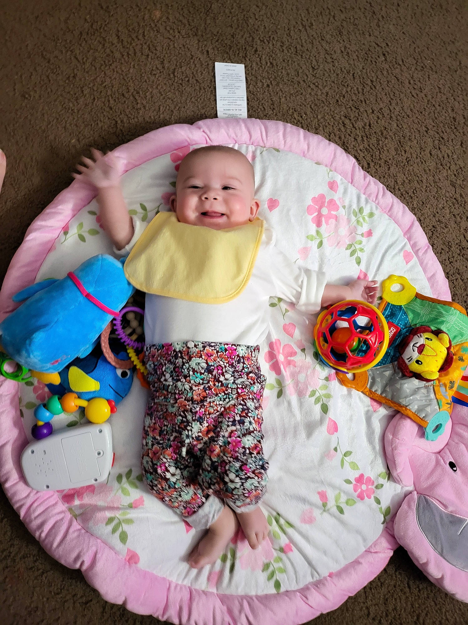 Ariah is registered to the contest to win money with this photo: baby, baby_products, baby_toddler_clothing, child, comfort, fun, head, linens, mammal, pattern, person, pink, product, shorts, sleeve, smile, t_shirt, textile, toddler, vertebrate