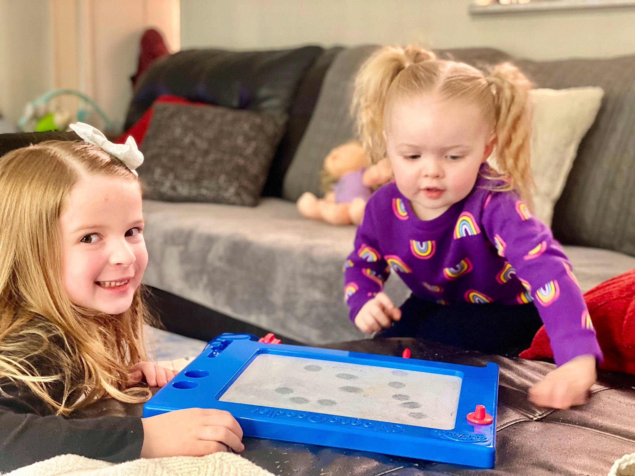 Ellianna joined the competition — help win amazing prizes! baby, baby_toddler_clothing, beauty, child, comfort, couch, event, fun, happy, holiday, joy, learning, leisure, living_room, person, play, room, sharing, sitting, smile